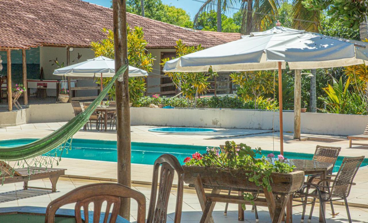 Hotel Praia Da Paixao Праду Екстер'єр фото
